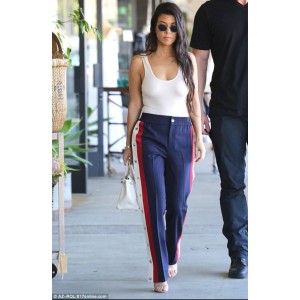 Kourtney Kardashian in track pants